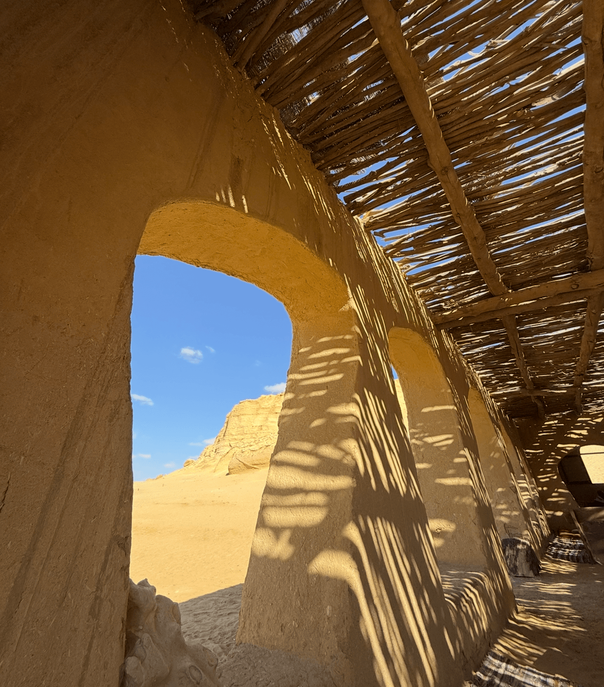 Traditional Bedouin camp with mud-brick architecture in Fayoum desert