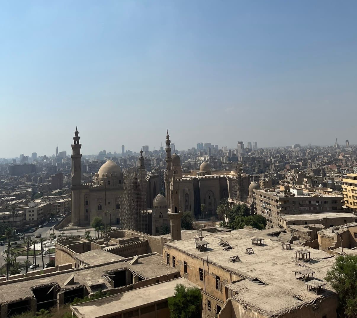 Panoramic view of Islamic Cairo from the Citadel featuring Sultan Hassan and Al-Rifai Mosques