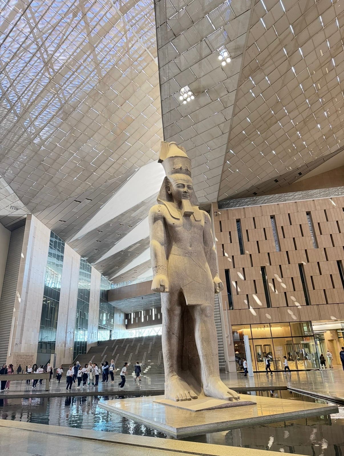 Colossal statue of Ramesses II in the Grand Egyptian Museum atrium