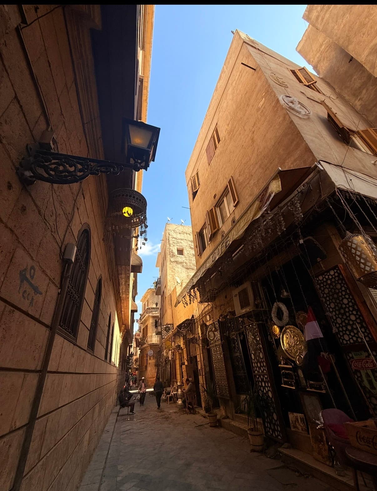 Narrow street with traditional lanterns in Old Islamic Cairo