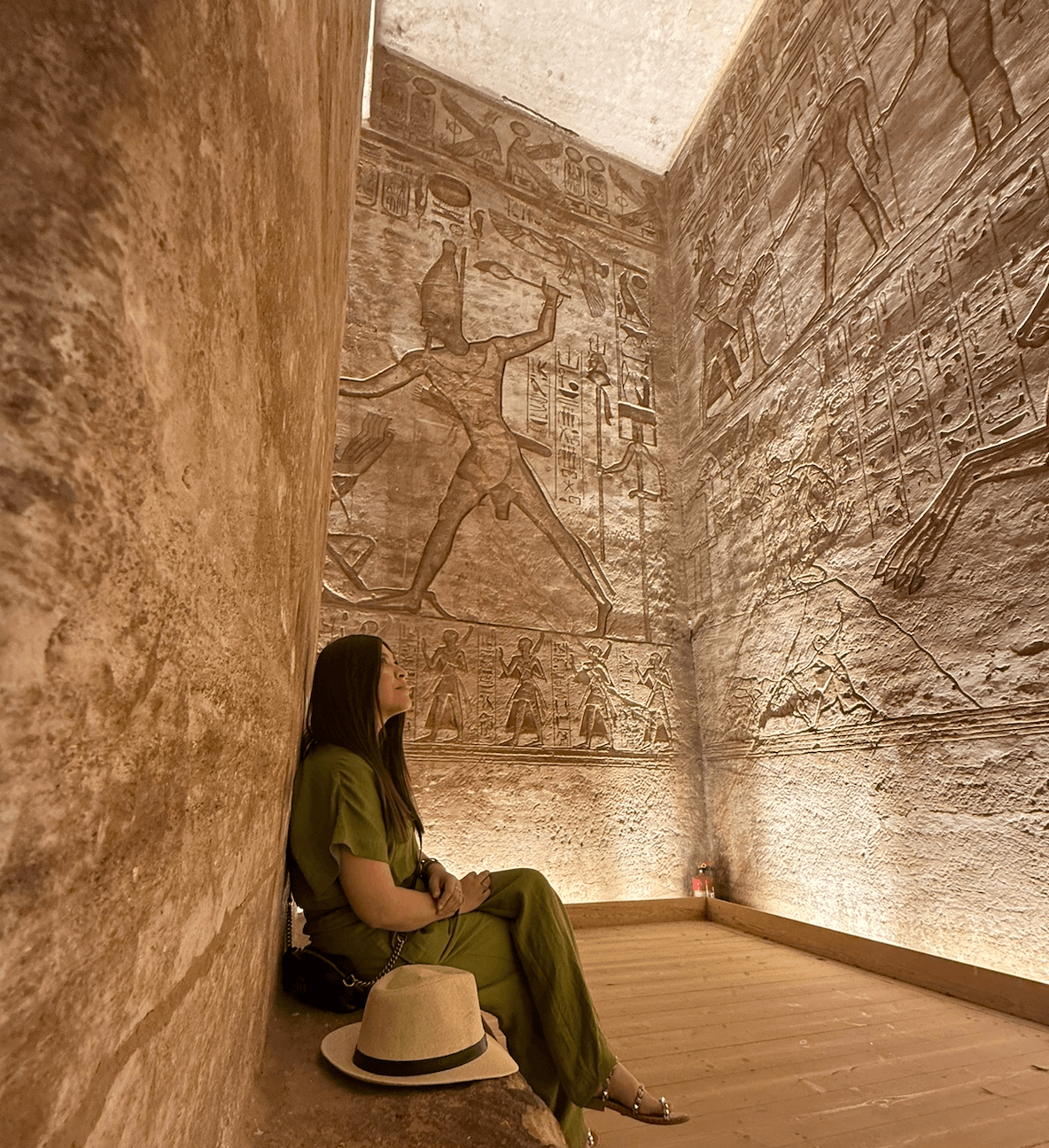 Abu Simbel temple interior with colossal hieroglyphic reliefs of Ramses II