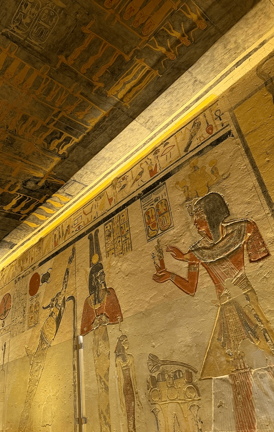 Ancient Egyptian tomb paintings and hieroglyphics inside Valley of the Kings